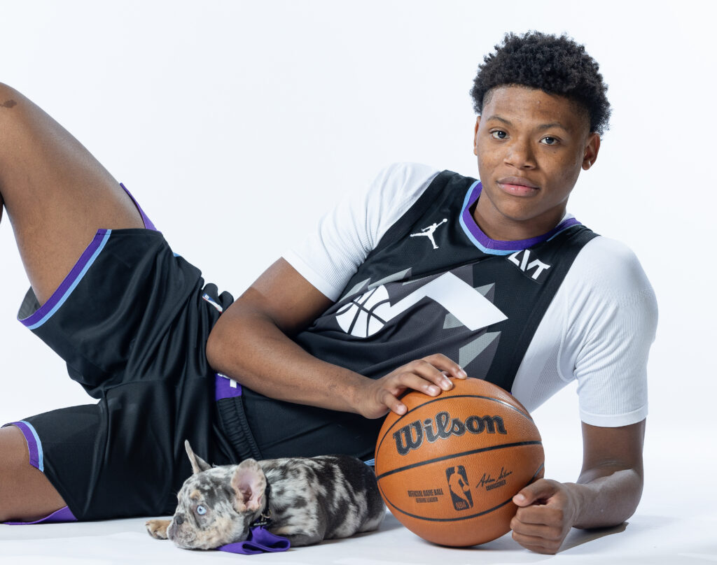 Ace Bailey poses for a portrait with his dog during Utah Jazz NBA Media 