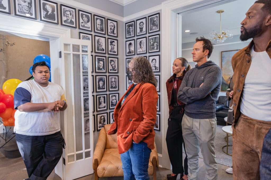 kids from the encircle house speak to Dwyane Wade and Gabrielle Uniond during their visit to the  Encircle House.