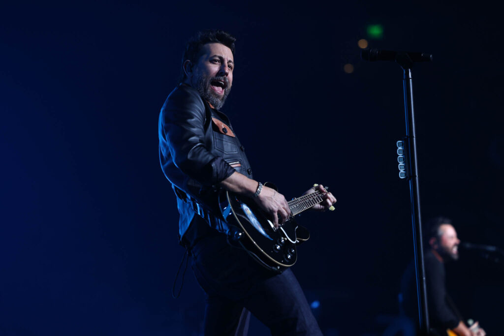 Old Dominion performing live in concert during a country music stage performance