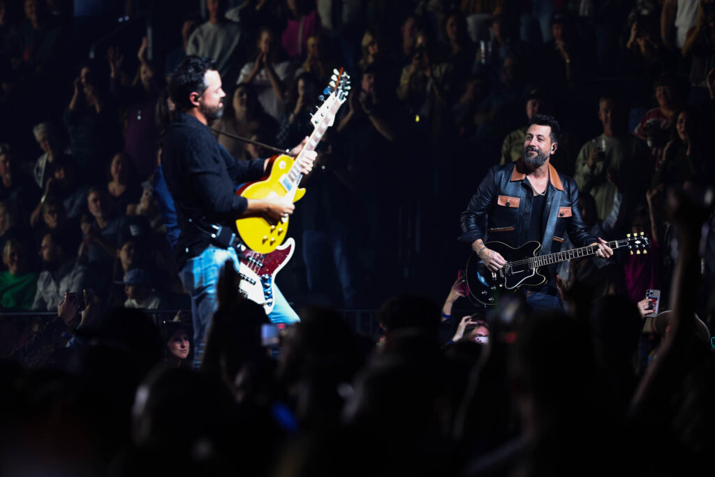 Old Dominion performing live in concert during a country music stage performance