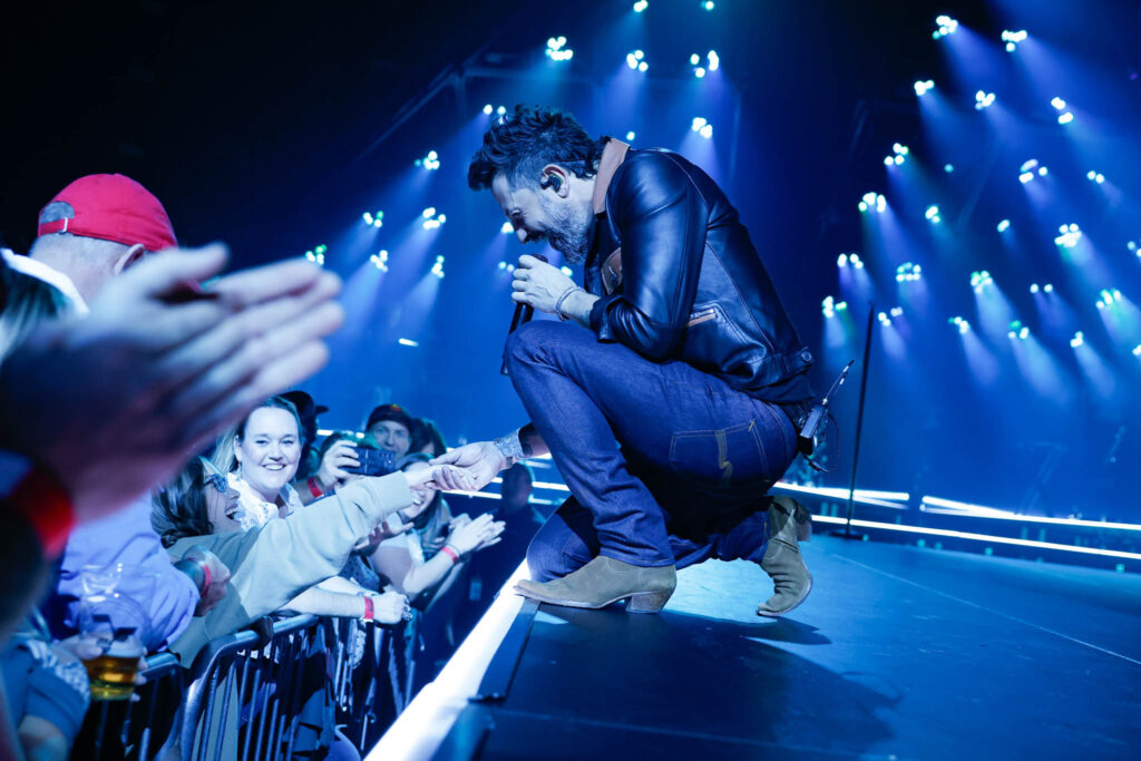 Old Dominion live concert performance with stage lighting and audience atmosphere