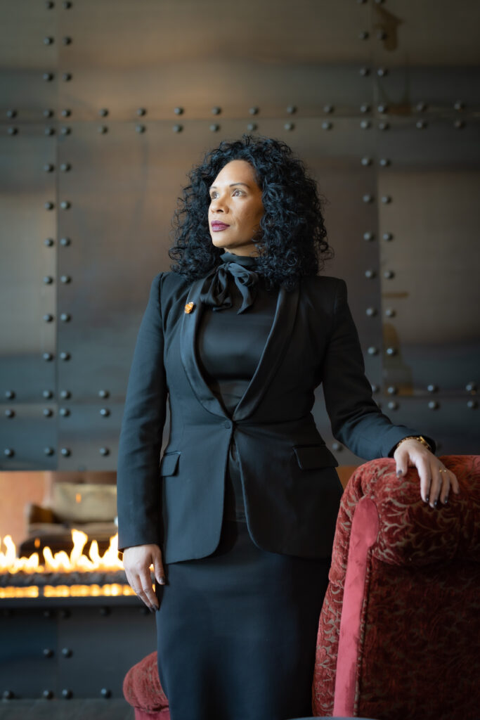 Editorial branding portrait of a professional woman photographed for magazine publication.