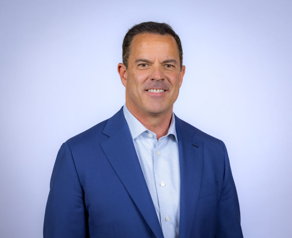 Professional headshot of an Olympic supporter and community advocate in Salt Lake City, Utah
